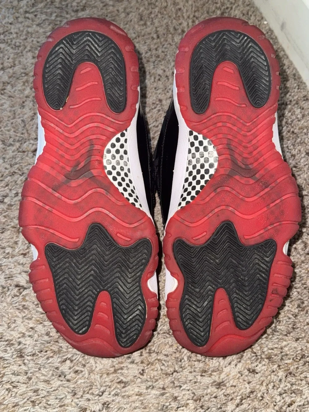 Jordan 11’s High-Top Sneakers “Bred”